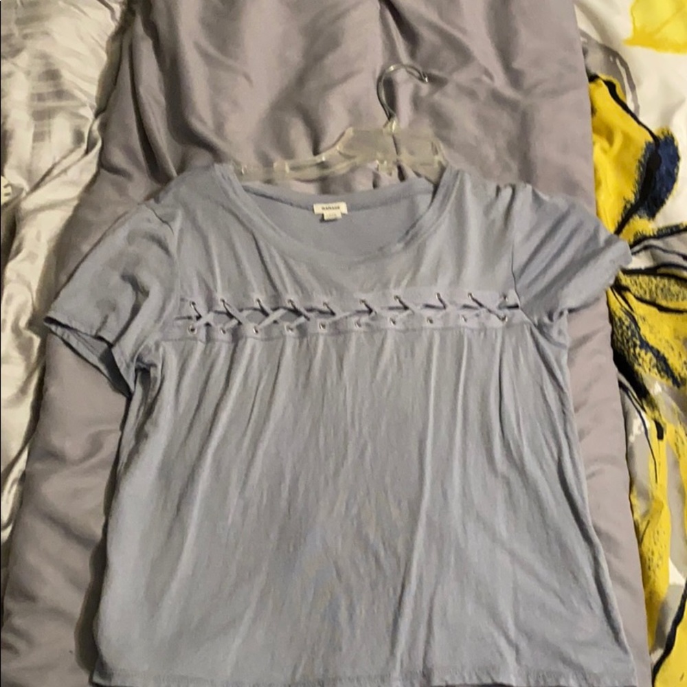 Light blue top.